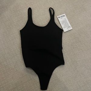 New with tags black lululemon bodysuit size 2